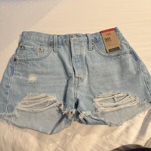 NWT Levi's Women's Distressed Light Blue Jean Shorts. Size 28